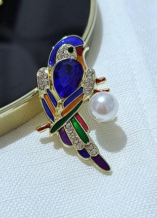 Брошь птица попугая синий камень