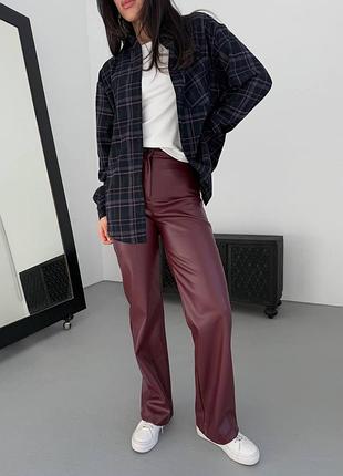 Жіночі шкіряні брюки штани кльош з еко шкіри