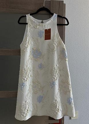 Сукня в розмірі xs-s, нова з біркою. з жакарду, з люрексовою ниткою. підклад віскоза.