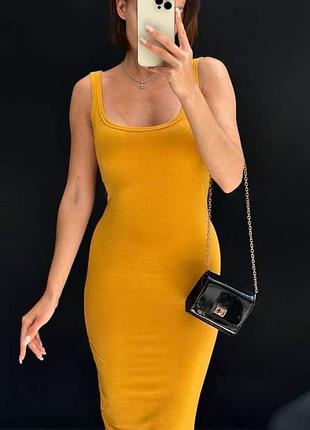Сарафан/платье горчичный цвет 
размер : 44/46
материал: трикотаж
состав: вискоза и полиэстер
приталенное, без застежки, с разрезом сзади, на бретельках