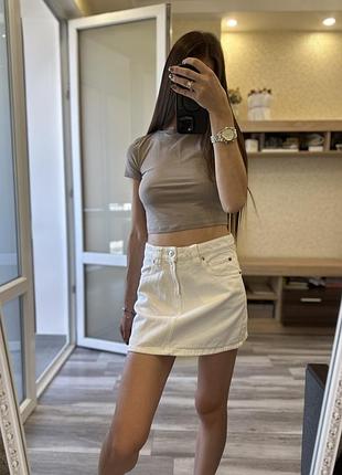 Біла джинсова спідниця