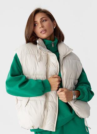 Жіноча тепла подовжена жилетка