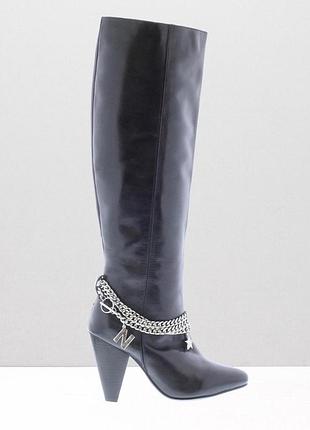 Шкіряні високі чоботи