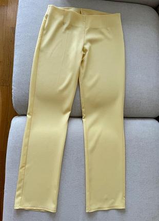 Брюки в жовтому кольорі класичні