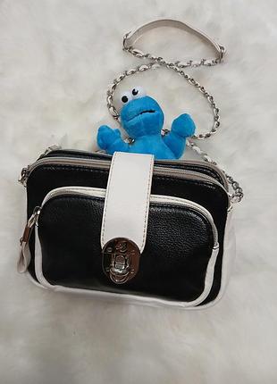 Маленька сумочка на три відділення