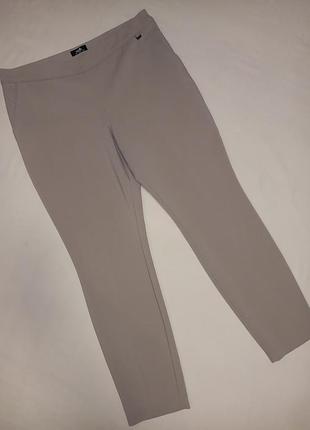 Красивые светлые женские брюки штаны