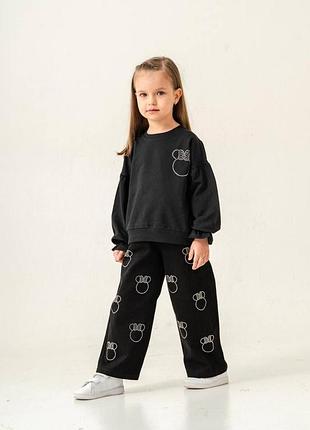 Костюм дитячий трикотажний чорний з візерунком міккі маус стрази.