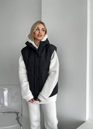 Женская жилетка