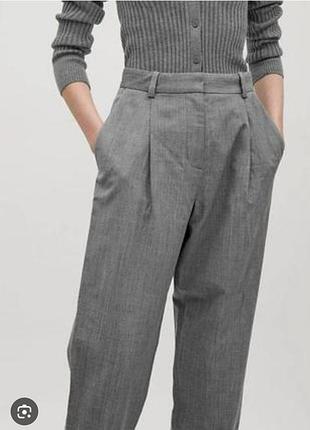 Брюки- бананы с защипами