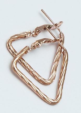 Серьги №39 цена за 12 шт желтые треугольники .