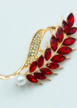Брошка no285 колосок із червоними стазами та білою перлиною броші недорого з китаю