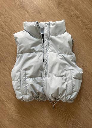 Жіночк жилетка