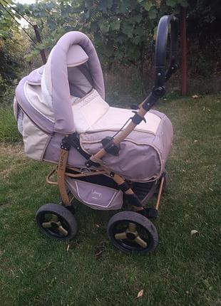 Дитяча коляска-трансформер adamex young