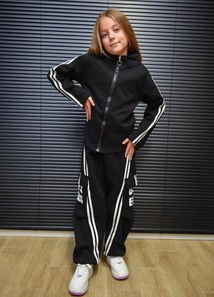 Дуже стильний костюм для дівчаток тканина плотна двуниткавнизу штанів є куліска