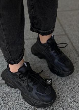 Чорні кросівки повністю нові