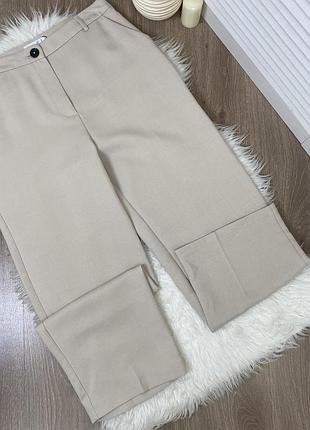 Брюки бежеві класичні палаццо