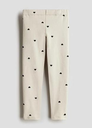 Стильные брендовые лосины с легким утеплением и регулируемым поясом.