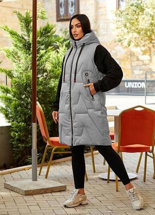 Женская жилетка