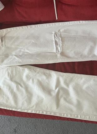 Джинсы молочні