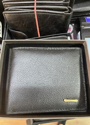 Шкіряні гаманці