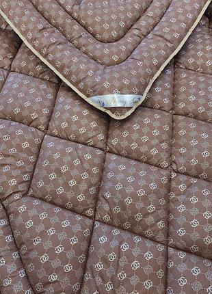 Теплі ковдри з мікросатину з вовняним наповненням