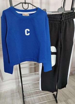 Дуже модний та якісний костюм для дівчинки штани палаццо знизу затягуються резинкою  виробник туреччина