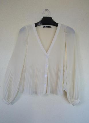 Ніжно жовта гафрована блуза від zara