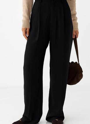 Класичні жіночі штани-палаццо зі складками