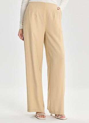 Бежеві брюки