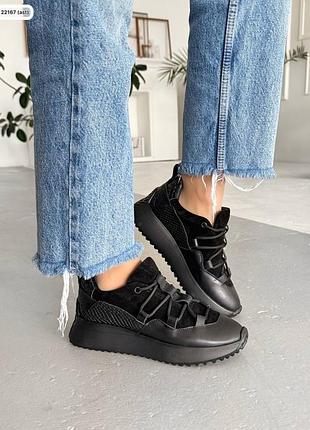 Чорні шкіряні кросівки