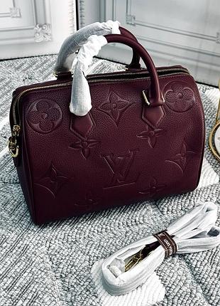 Сумка из кожи с тиснением