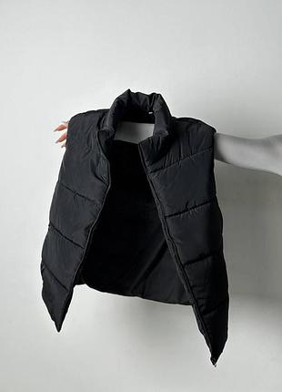 Женская дутая жилетка.