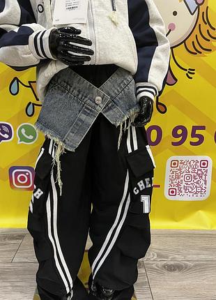 Штани карго з лампасами та накладними кишенями