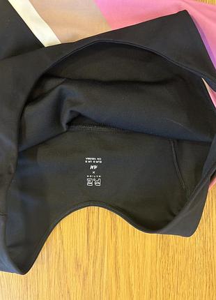 Облягаюча майка топ