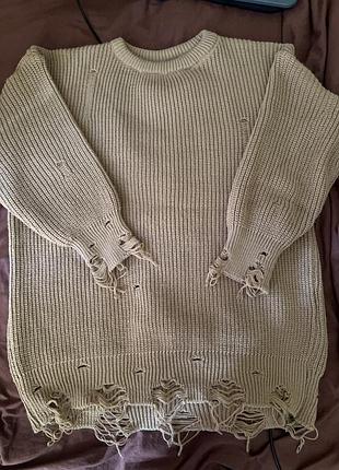 Вʼязаний светр туніка з рваними краями