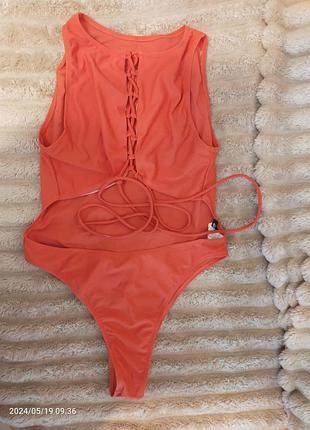 Купальники слитные