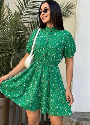 Сукня зелена яскрава на гудзиках