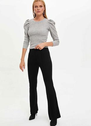 Брюки-клош від коліна