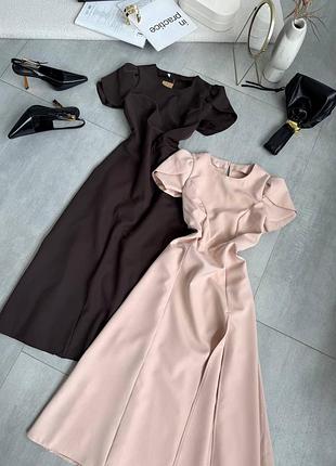 Жіноча сукня міді з розрізом на стегні