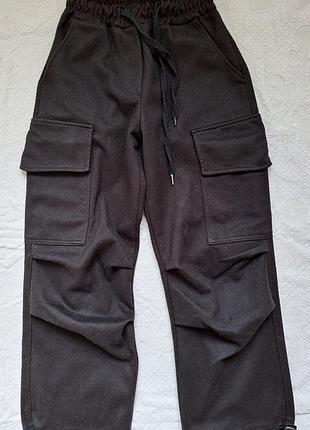 Утеплені штани карго чорного кольору для дівчинки підлітка на зріст 140 см