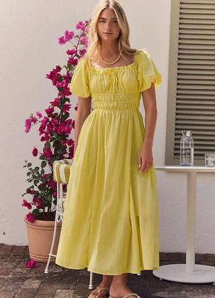 Розкішна довга сукня вільного крою з кишенями