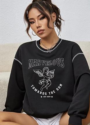 Кофта жіноча чорна marvelous. хороший приємний до тіла світшот з янголом. різко змінила стиль, тому вдягала лише 1 раз. фото на собі можу скинути в оп