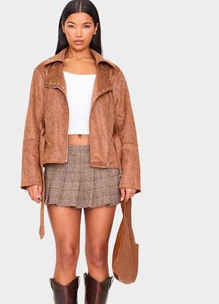 Жіноча косуха, шкірянка