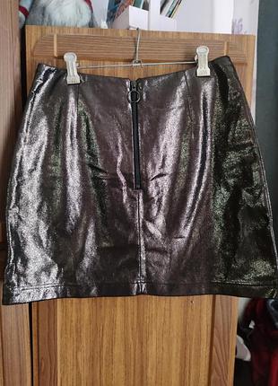 Блестящая юбка на замке