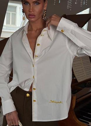 Сорочка біла з золотими ґудзиками