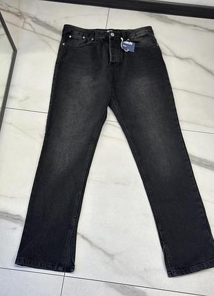 Нові джинси з розрізами 40р