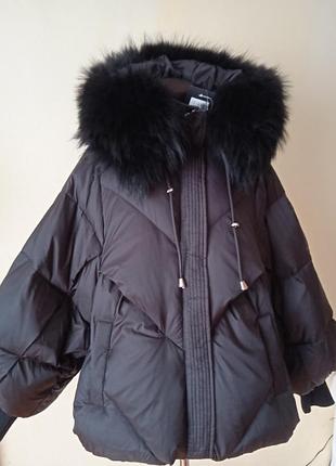 Куртка 100% лебединого пуху з  об'ємними рукавами. натуральне хутро енота  на капюшоні