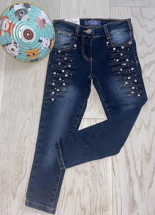 Нові яскраві джинси з камінцями
