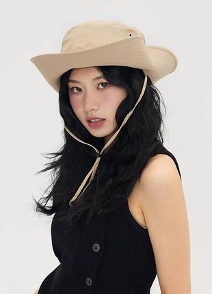 Панама з шийним шнурком туристична бежевого кольору