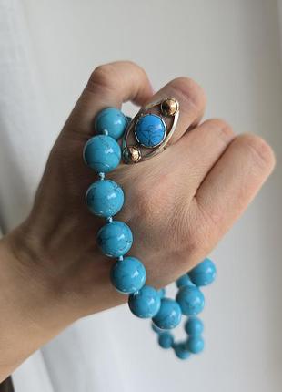 Превосходное серебряное колечко с бирюзой и золотой напайкой